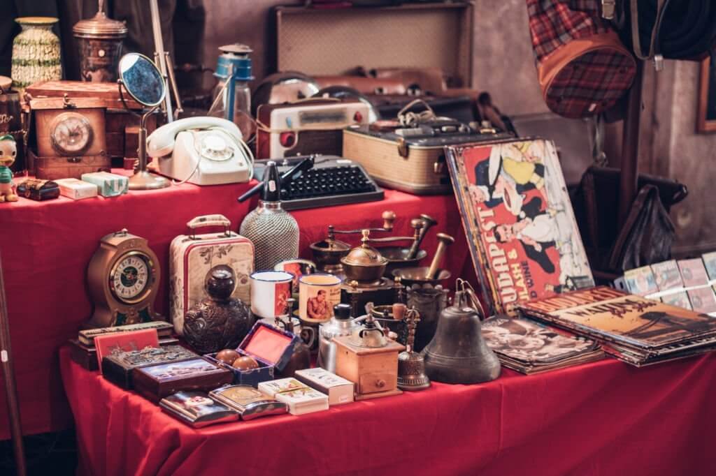 The short answer is yes. You can sell antique goods on Etsy