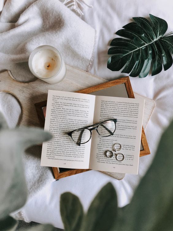 The glasses are centered in this flat lay photo. Notice how it also brings in some lifestyle elements