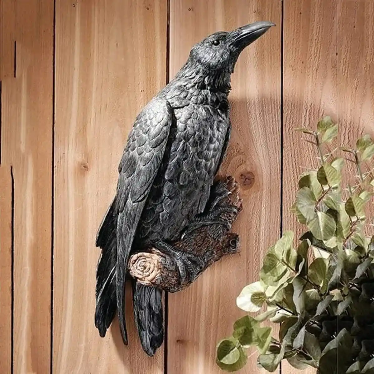 The seventh shoutout in weird best-selling Halloween dropshipping products is raven statue Halloween decor